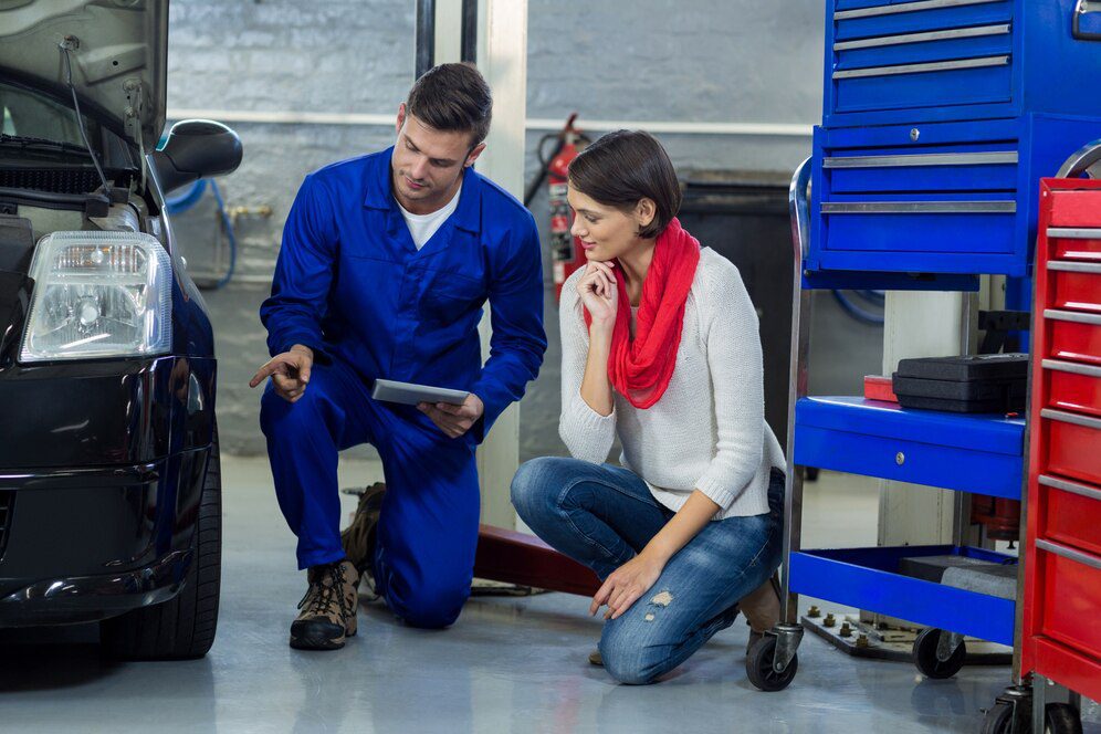 Mechanic Consulting with Car Owner